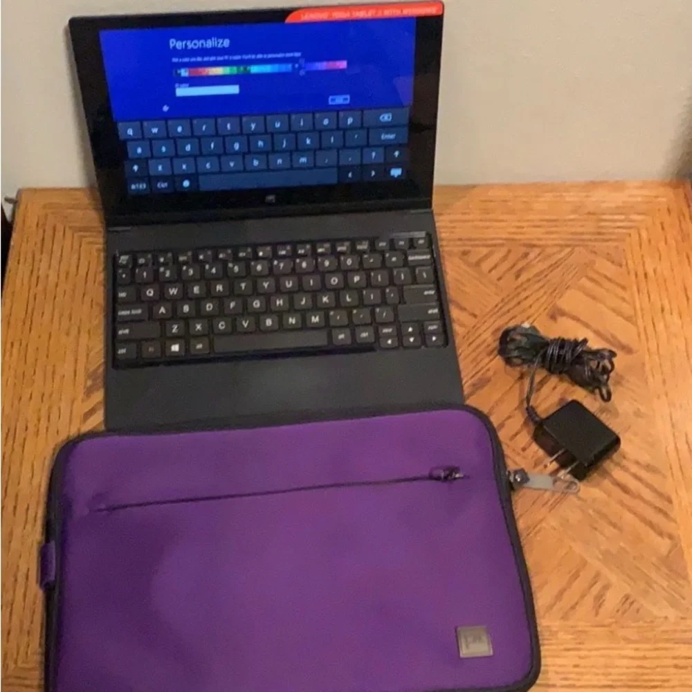 Lenovo Black Laptop with Silver Logo
